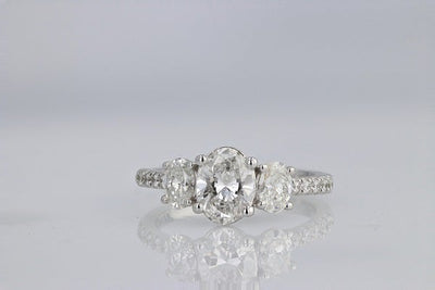 DIAMOND ENGAGEMENT RINGS - 14K White Gold 1.80cttw With 1.00ct F/SI1 Lab Grown Oval Cut 3-Stone Plus Diamond Engagement Ring.