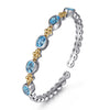 6.25" Sterling Silver & 14K Yellow Gold Bujukan Blue Topaz Open Bangle Bracelet