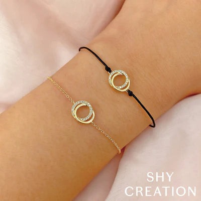 BRACELETS - 14K Yellow Gold 0.07cttw Diamond Love Knot Circle 7" Adjustable Bracelet