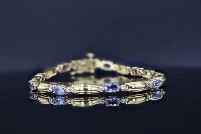 BRACELETS - Estate 14K Yellow Gold Oval Tanzanite & Diamond Link Bracelet