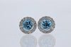 EARRINGS - 14K White Gold 5mm Round Blue Topaz Diamond Halo Stud Earrings