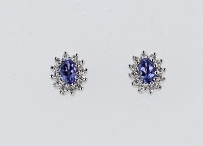 EARRINGS - 14K White Gold 5x3mm Oval Tanzanite And Diamond Halo Stud Earrings