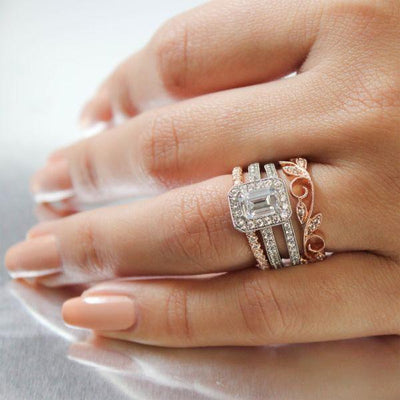 ENGAGEMENT - 1.50cttw Emerald Cut Bead Set Halo Diamond Engagement Ring With 7x5mm Center Diamond