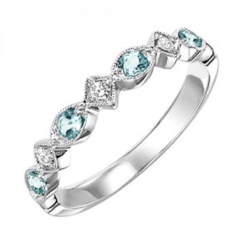 JEWELRY - 10k White Gold Diamond And Blue Topaz Birthstone Ring