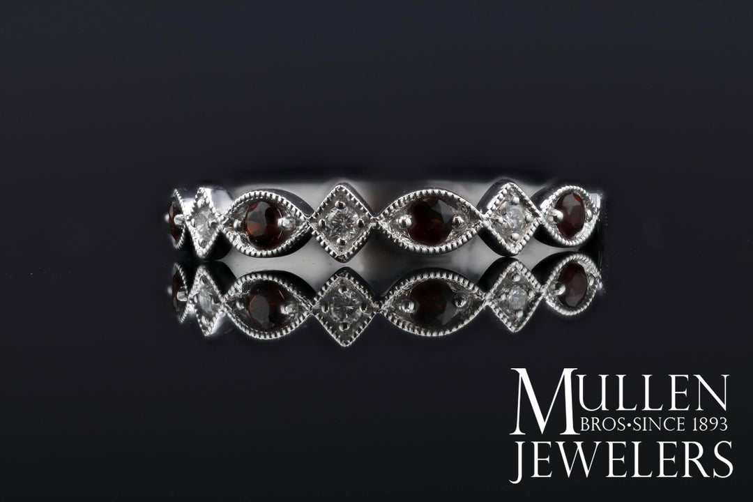 JEWELRY - 10k White Gold Diamond And Garnet Birthstone Ring