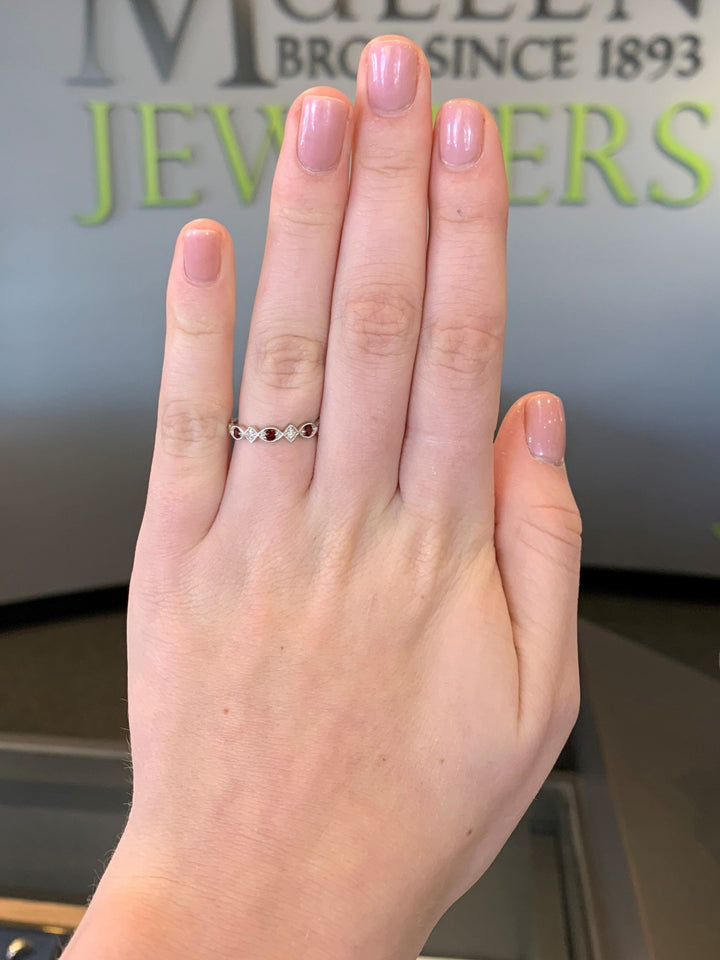 JEWELRY - 10k White Gold Diamond And Garnet Birthstone Ring