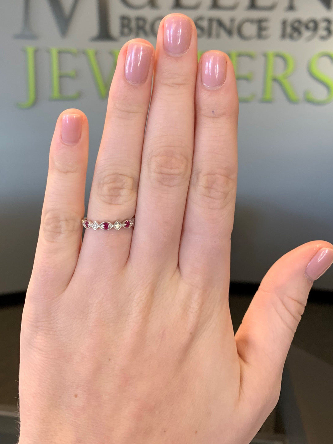 JEWELRY - 10k White Gold Diamond And Ruby Birthstone Ring