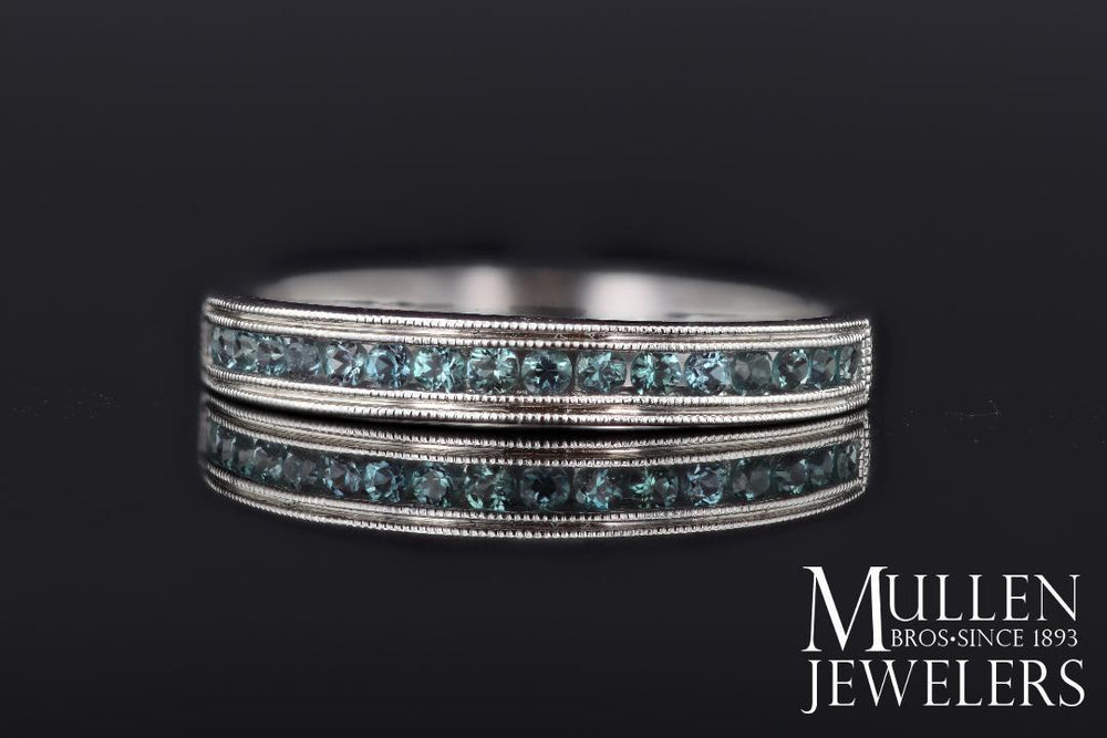 RINGS - 10k White Gold Blue Topaz Channel Set Birthstone Ring