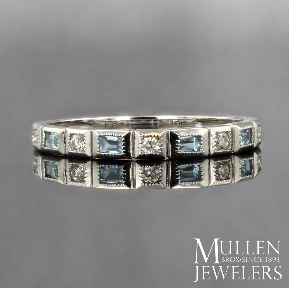 RINGS - 10k White Gold Diamond And Emerald Cut Blue Topaz Birthstone Ring