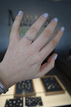 RINGS - 10k White Gold Diamond And Emerald Cut Blue Topaz Birthstone Ring