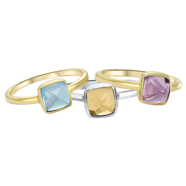 RINGS - 10K Yellow Gold Bezel Set Blue Topaz Ring