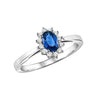 RINGS - 14K White Gold Sapphire And Diamond Oval Halo Ring.