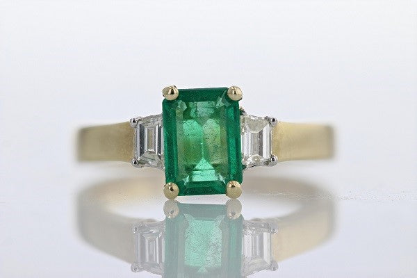 RINGS - 14K Yellow Gold 1.28cttw Emerald Cut Emerald & Diamond Baguette Accent Band.
